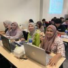 Women working on laptops