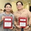 Men with certificates