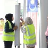 Workers with flag